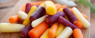 Case of Baby rainbow organic carrots, whole and peeled